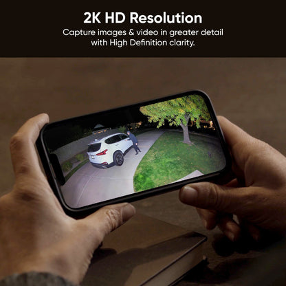 Hands holding phone looking at 2K camera footage with a 160° super-wide view
