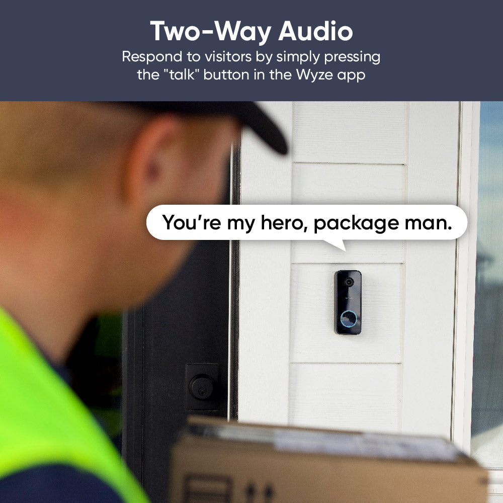 Delivery person standing in front of doorbell camera as someone speaks through it