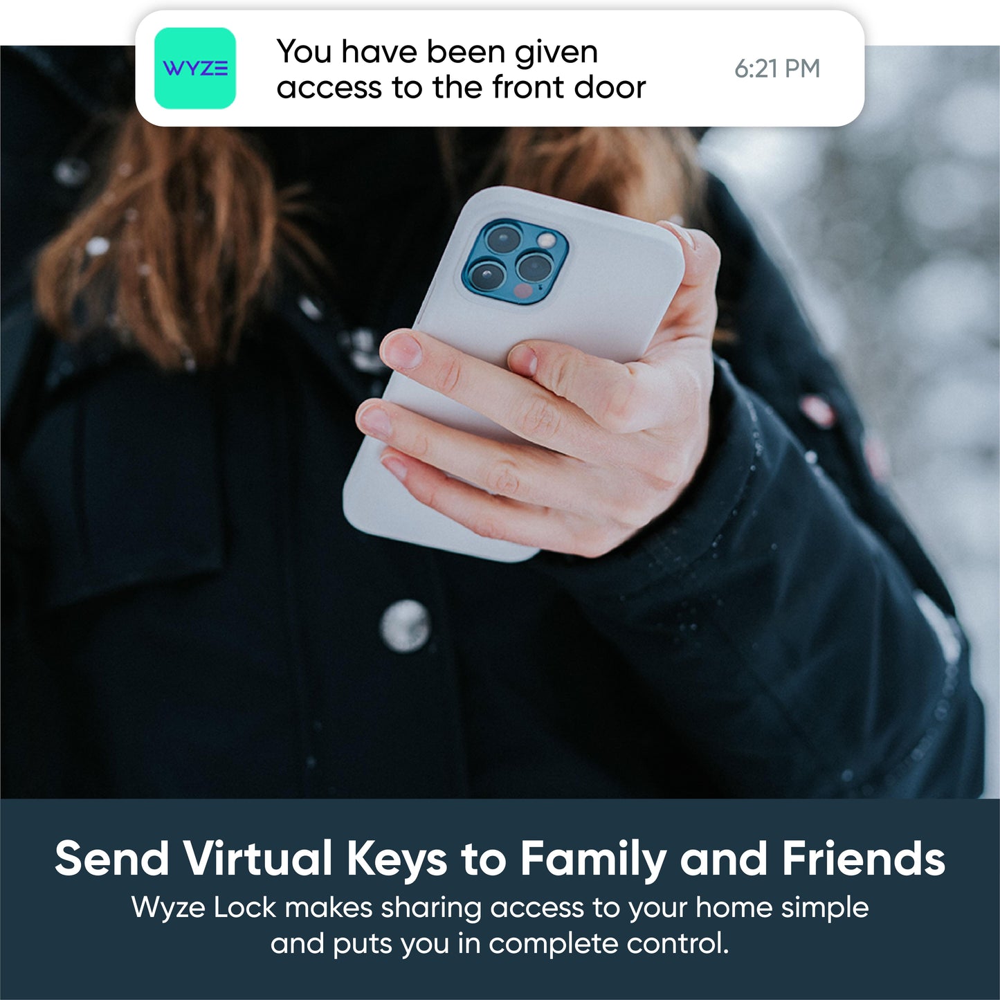 Woman holding a phone with an overlay of a phone notification that informs her of a virtual key to the home.