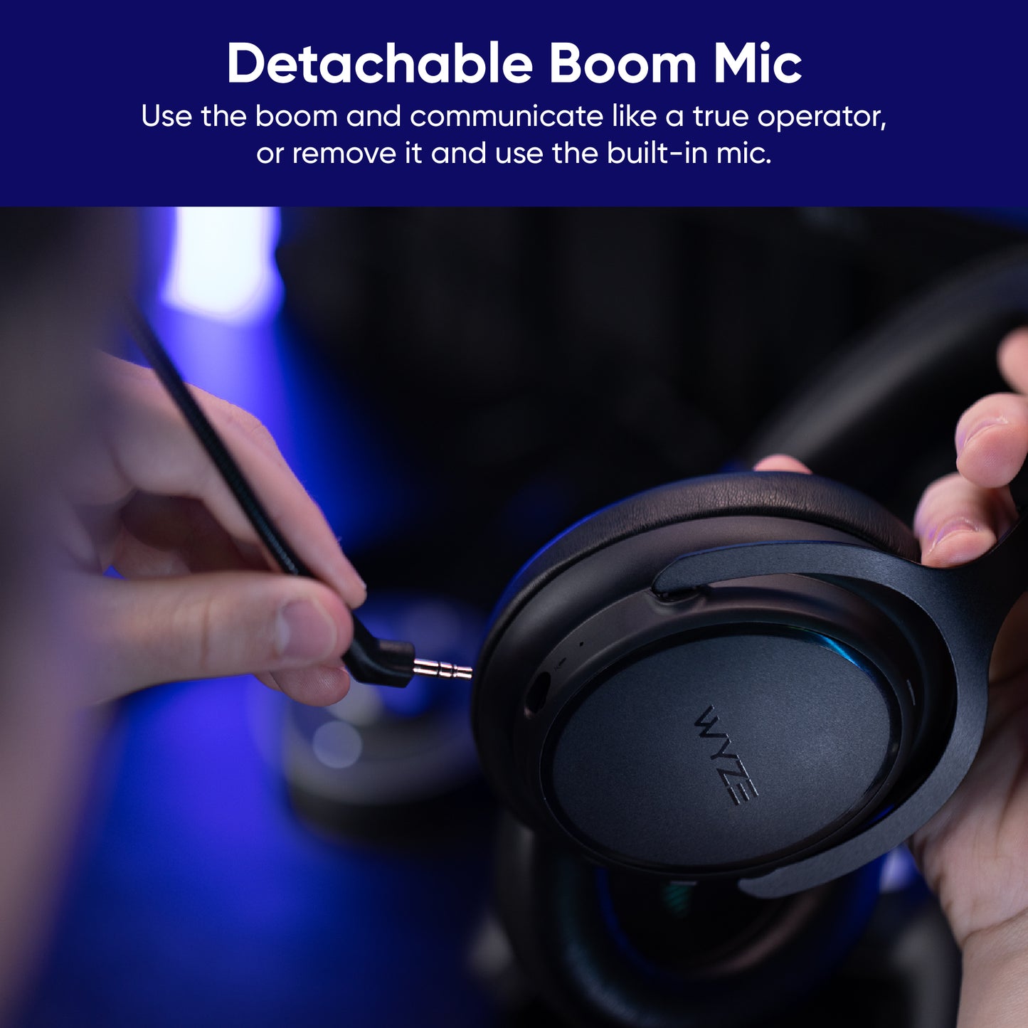 Person plugging detachable boom mic into gaming headset. Text overlays says, "Use the detachable boom mic to communicate like a true operator or remove it and use the built in mic."