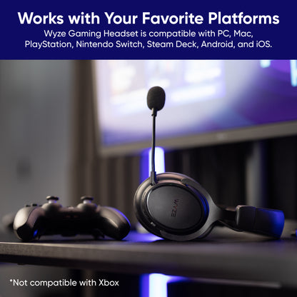 Wireless Gaming Headset laying on table next to gaming controller. Text overlay says, "Works with your favorite platforms, compatible with PC, mac, playstation, nintendo switch, steam deck, android, and iOS. Not compatible with Xbox."