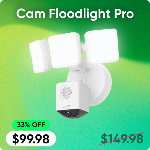 WYZ Cam Floodlight Pro security camera with price tag on a green gradient background