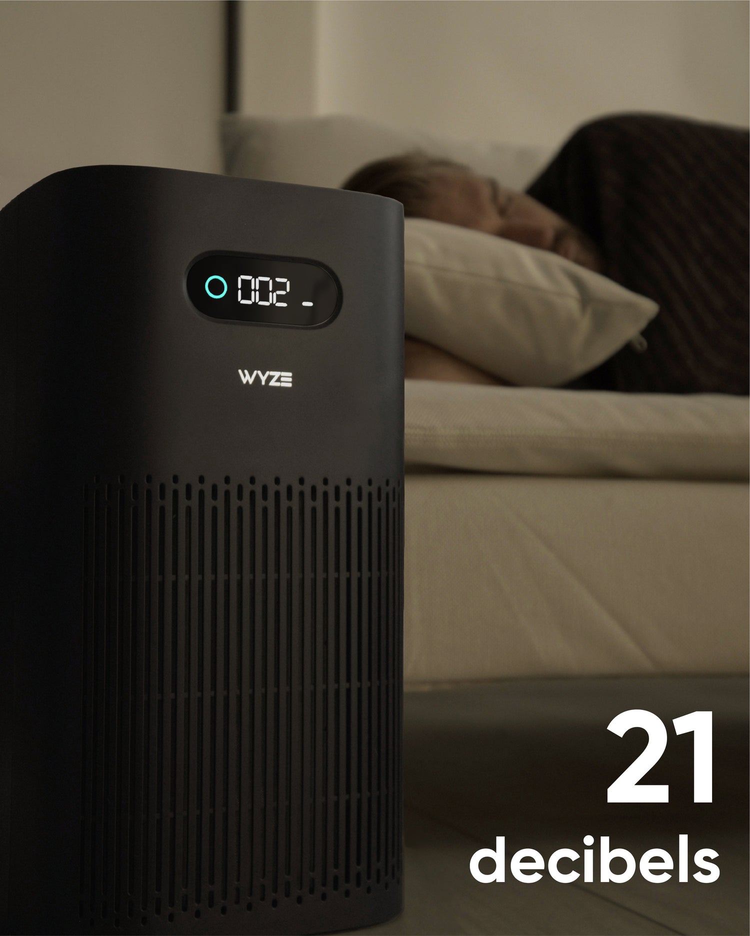 Runs quiet, air purifier next to a person sleeping in bed