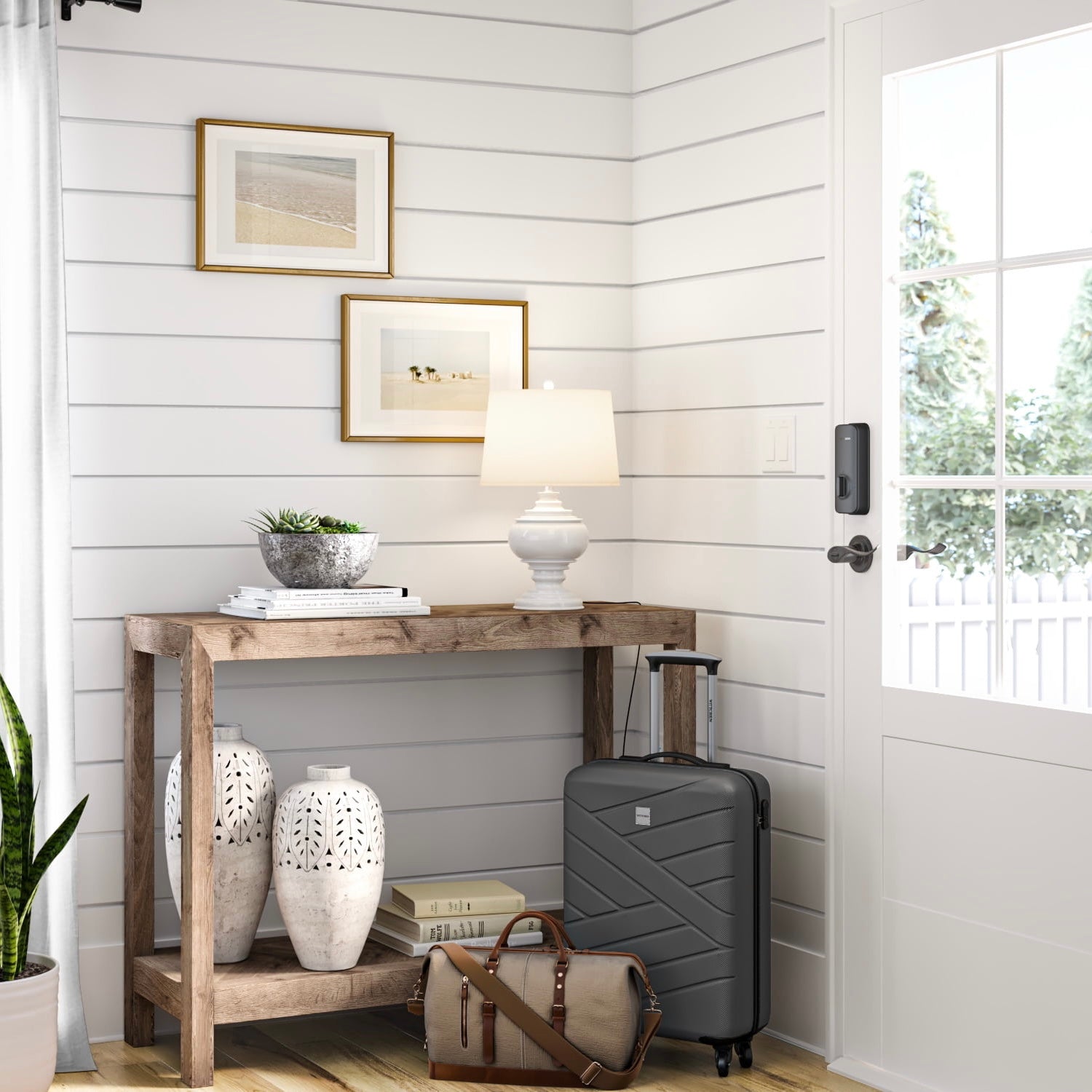 Entryway with a side table and luggage next to a white wood door with the Wyze Lock Bolt installed