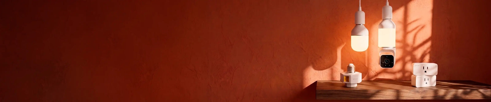 Light bulbs on a wooden surface with a warm brown background