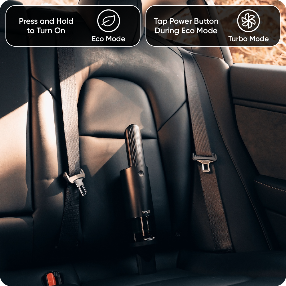 Wyze Hand Vac sitting upright in back seat of Tesla model 3
