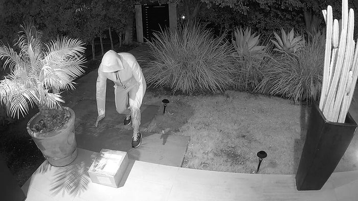 Black and white video with thief grabbing packaging.