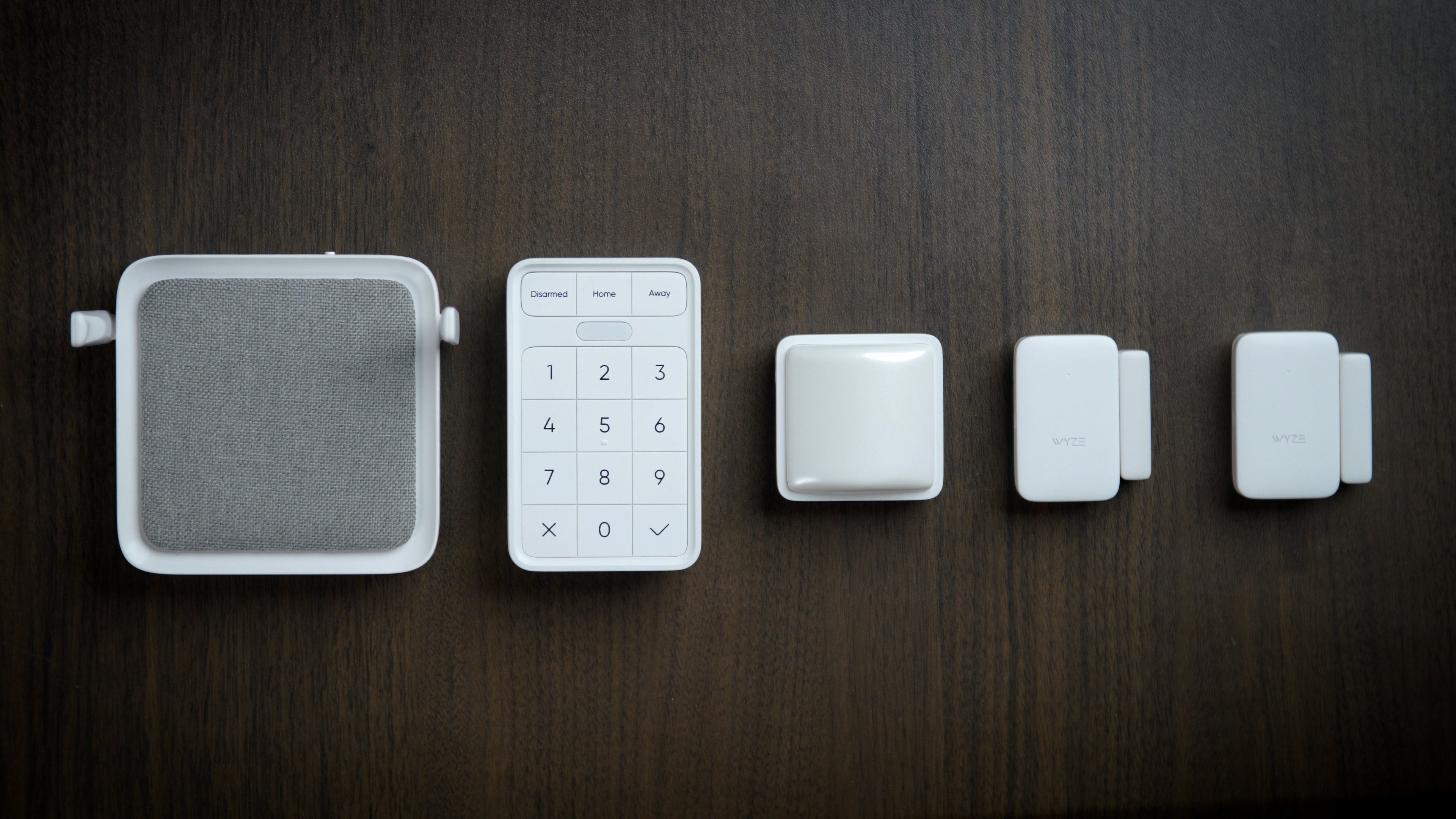 A white and grey calculator with a number pad and buttons.