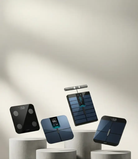 Set of smart scales on a neutral background