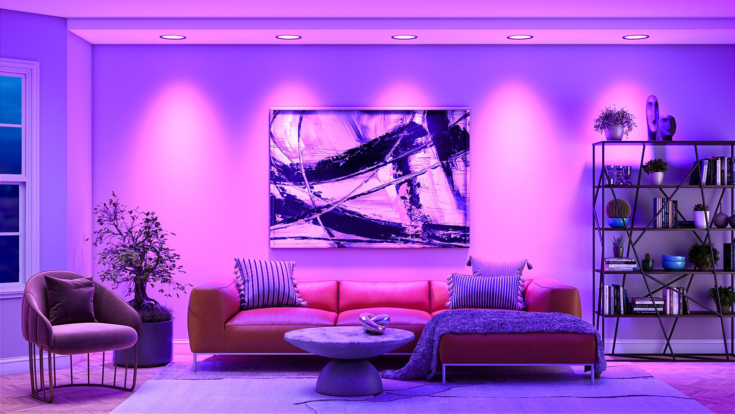 Livingroom with 5 overhead recessed lights casting a pink purple light
