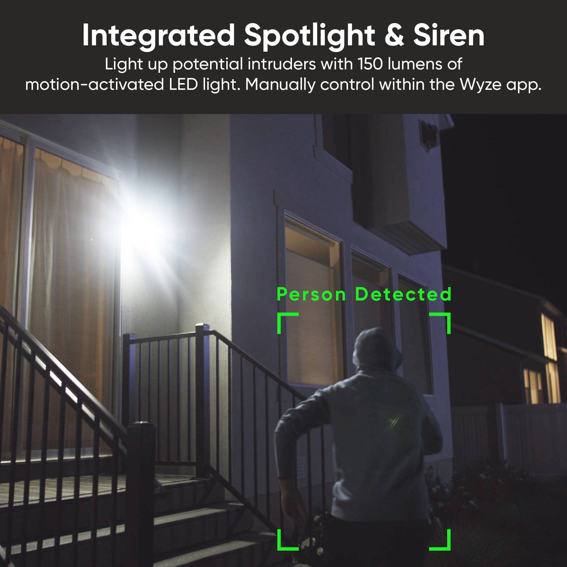 Bright spotlight is on in back porch as person runs by camera.