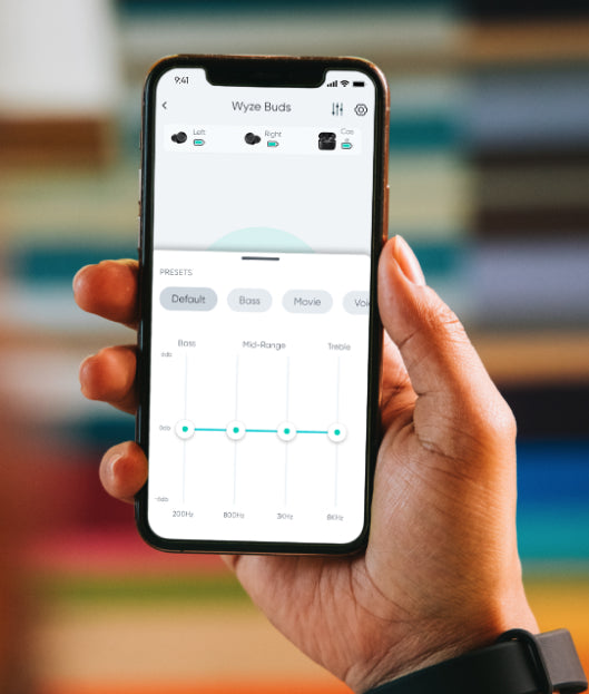 Person holding phone looking at Wyze buds in the Wyze app