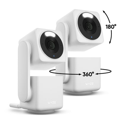 White security camera with 360-degree and 180-degree rotation capabilities on a white background
