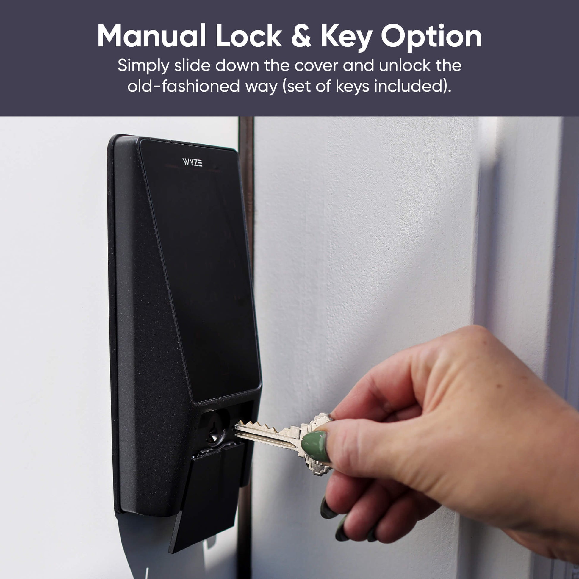 Hand using a key to unlock a black door lock mechanism with text about manual lock and key option.