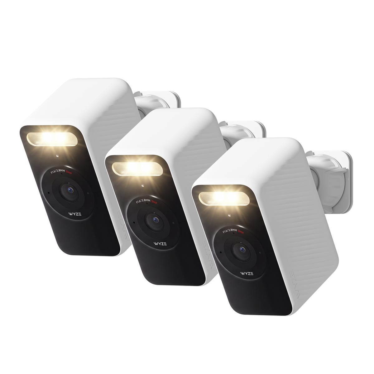  Three white Wyze Battery Cams shown at an angle with its spotlight illuminated and wall mount attached.