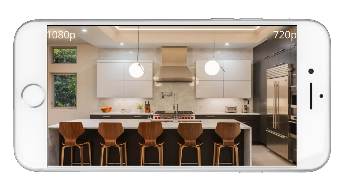 A black Wyze Cam is displayed in a kitchen setting.