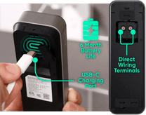 A person plugging a device into a wall.