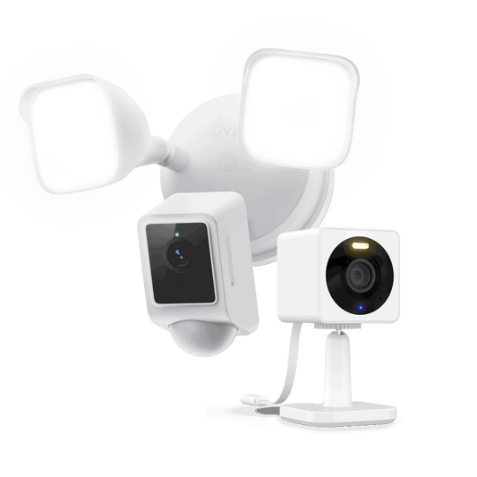 Wyze Floodlight + OG Security Kit: A white floodlight with a camera attached for security purposes.