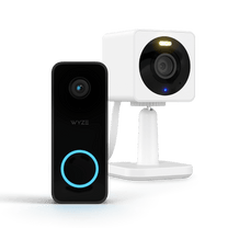 A black and blue camera with a white base.