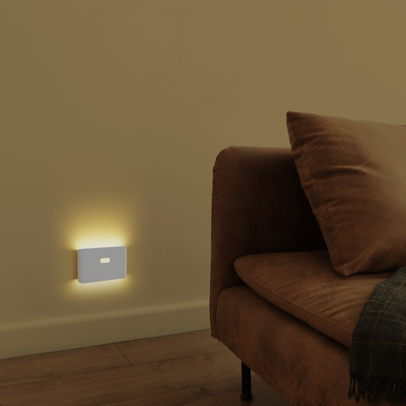Wyze Night Light on wall next to a couch