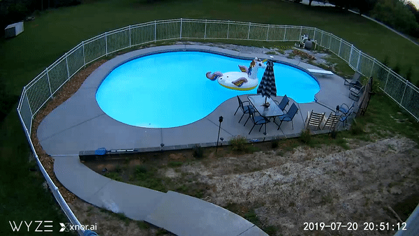 A pool with a floatie in it. 3