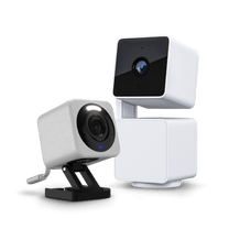 A white camera and a white box.