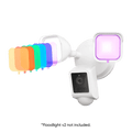 A white camera with a purple light on it.