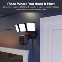 Wyze Cam Floodlight v2 + Plug-In Mount: A black camera with a floodlight attached to it.