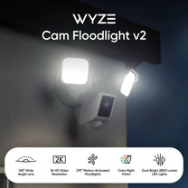 A white camera with a blue light on.