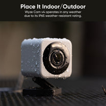 A white camera with a 32GB microSD card.
