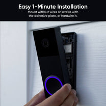 A person is installing a Wyze Duo Cam Battery Doorbell.