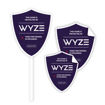 A purple sign with the word "Wyze" on it.