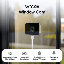 A Wyze Cam is mounted on a window with a two-way audio feature.