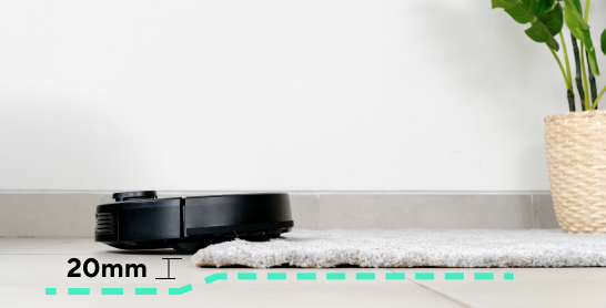 wyze robot vacuum moving from a carpet to tile floor