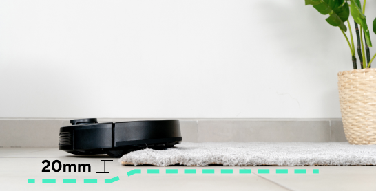 Wyze Robot Vacuum moving from a carpet to tile floor.