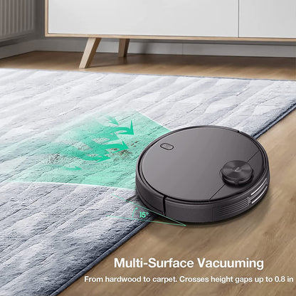 Robot vacuum transitioning from wood flooring to a rug. White text overlay that says "Multi-Surface Vacuuming." 