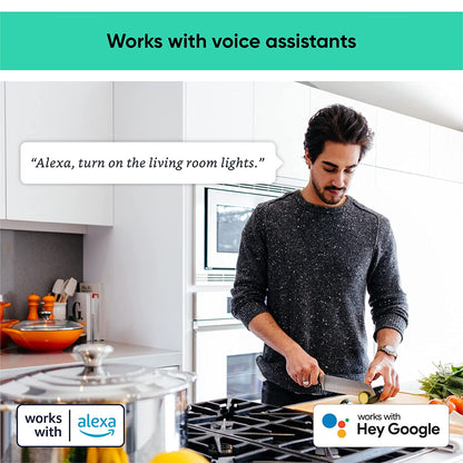 Man standing in a kitchen and cooking. Text overlay that says "Works with voice assistants."