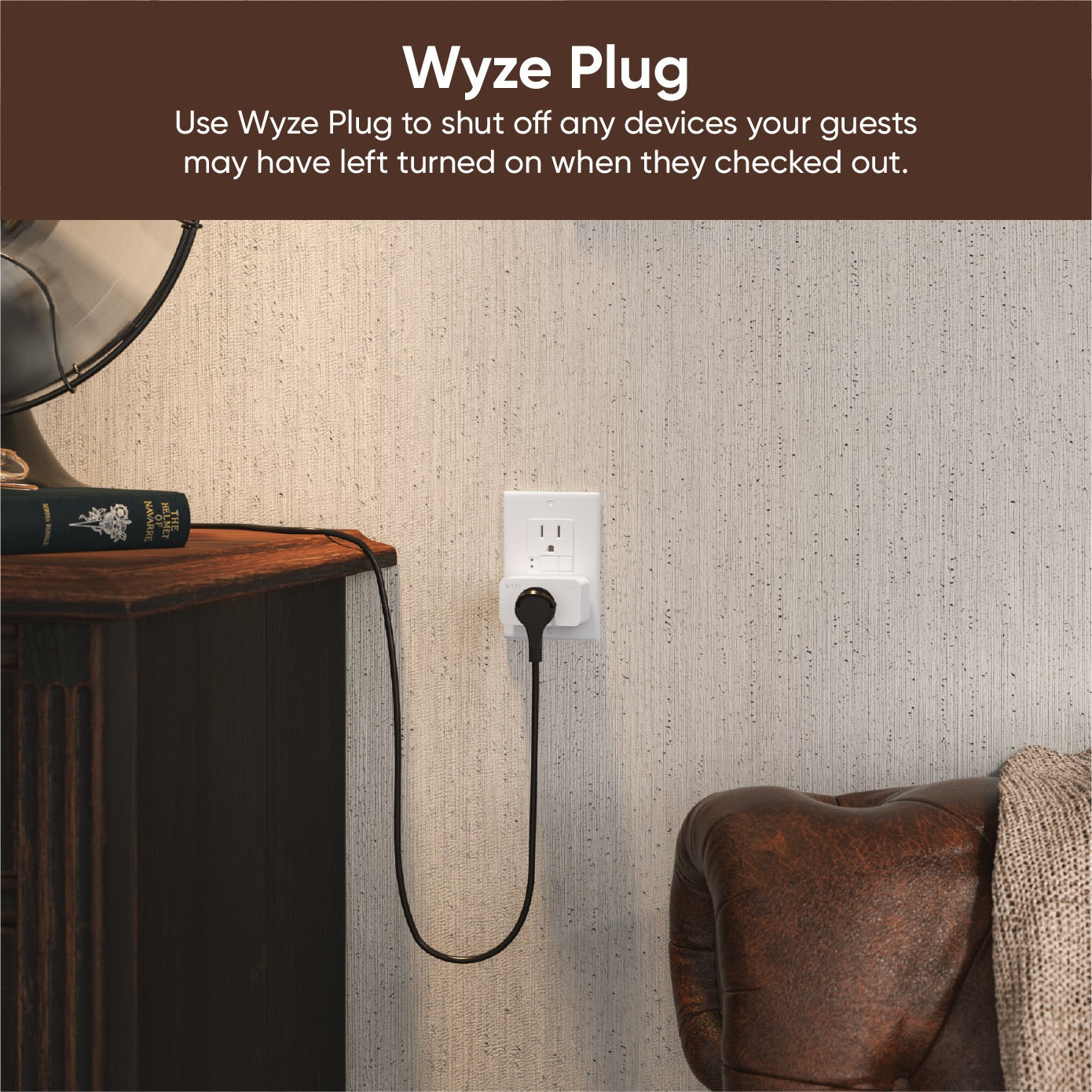 Wyze Plug in a wall outlet with a small house fan attached.