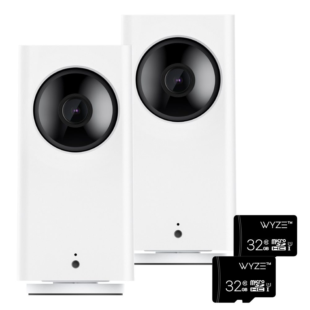 2 Wyze Cam Pan v2's and 2 32GB Micro SD cards in white background. 