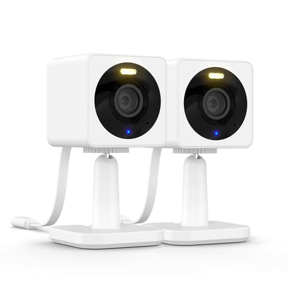 Two Wyze Cam OG standards next to eachother against a white background.