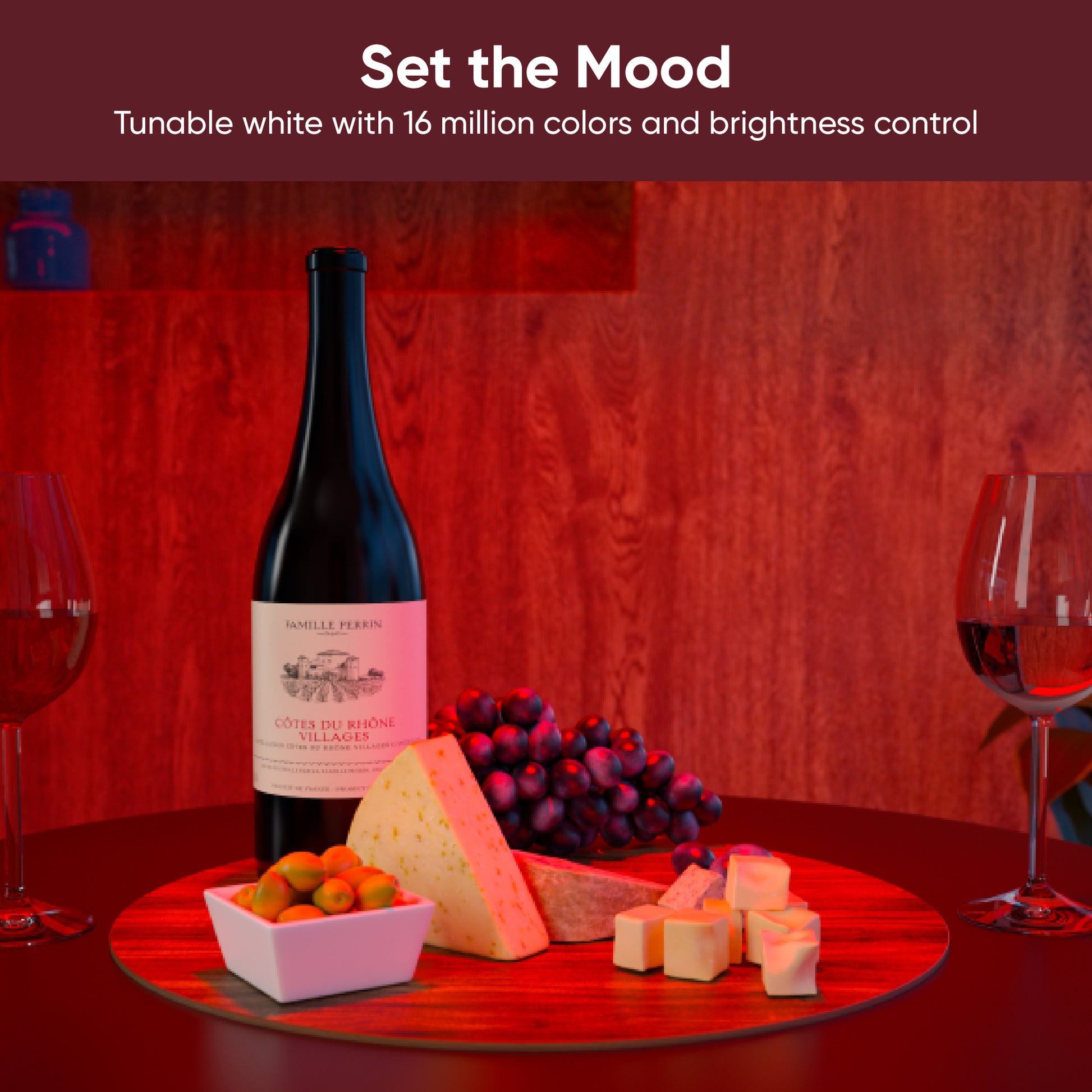 Kitchen table with wine and horderves being lit by a red light. White text overlay that says "Set the Mood."