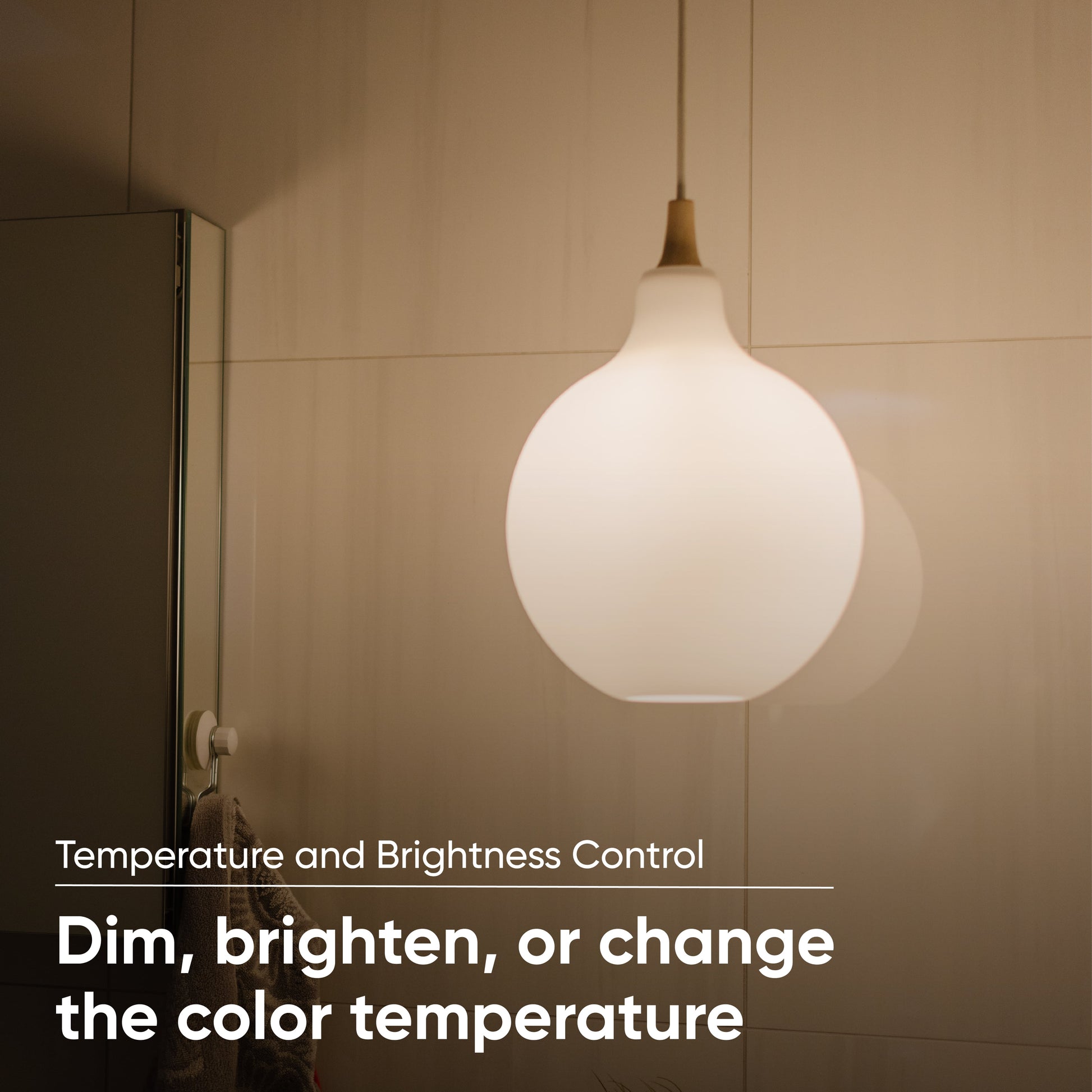 Hanging pendant light fixture with Wyze Bulb set to a warm white. 