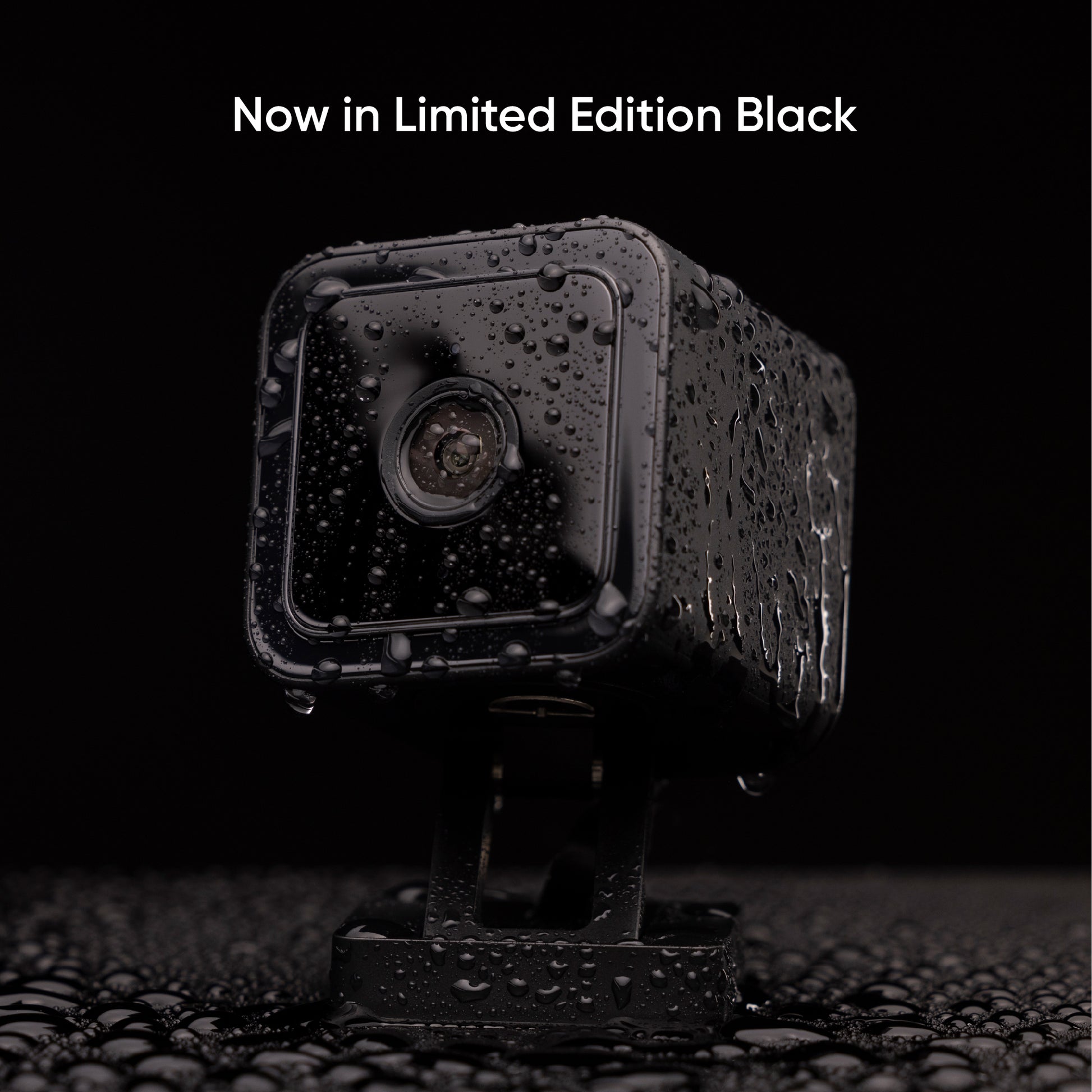 Wyze Cam v3 black edition model covered in water droplets
