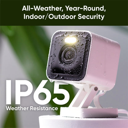 Wyze Cam v3 with water droplets. Text overlay "IP65 Weather Resistance."