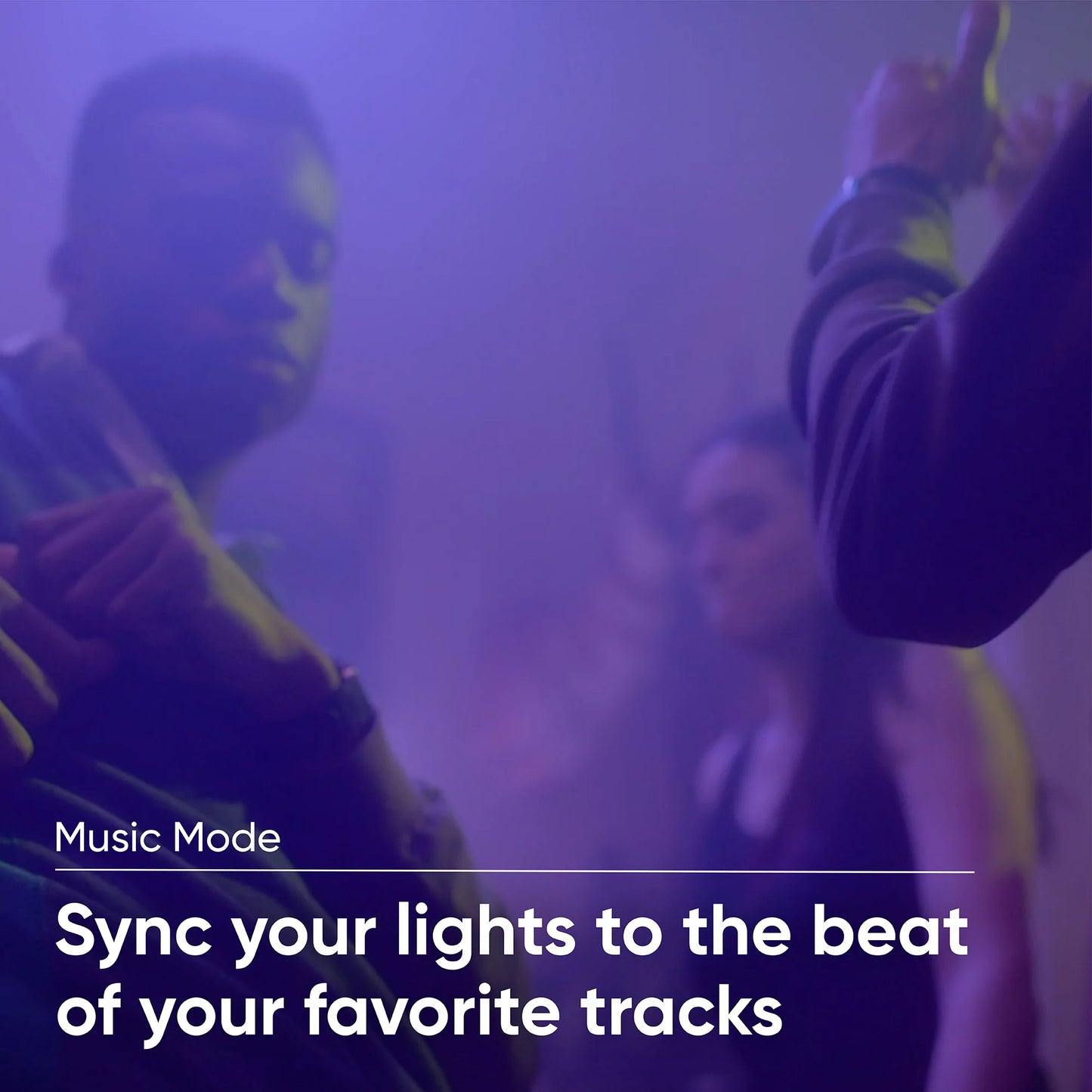 People dancing under the glow of purple lights. Text overlay that says "Music Mode."