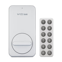 A white lock with a gray keypad.