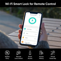 A person holding a smart lock for remote control.