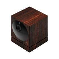 A black and brown wooden box with a camera on top.