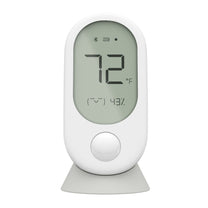 A white Wyze Room Sensor with a temperature reading of 72 degrees Fahrenheit.
