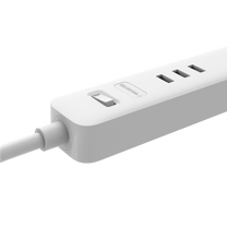 A white surge protector with 3 USB ports and 3 grounded outlets.